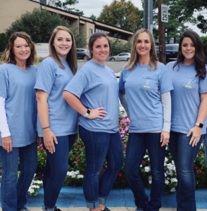 Backus Smiles, Dr. Backus and her team after doing charity work