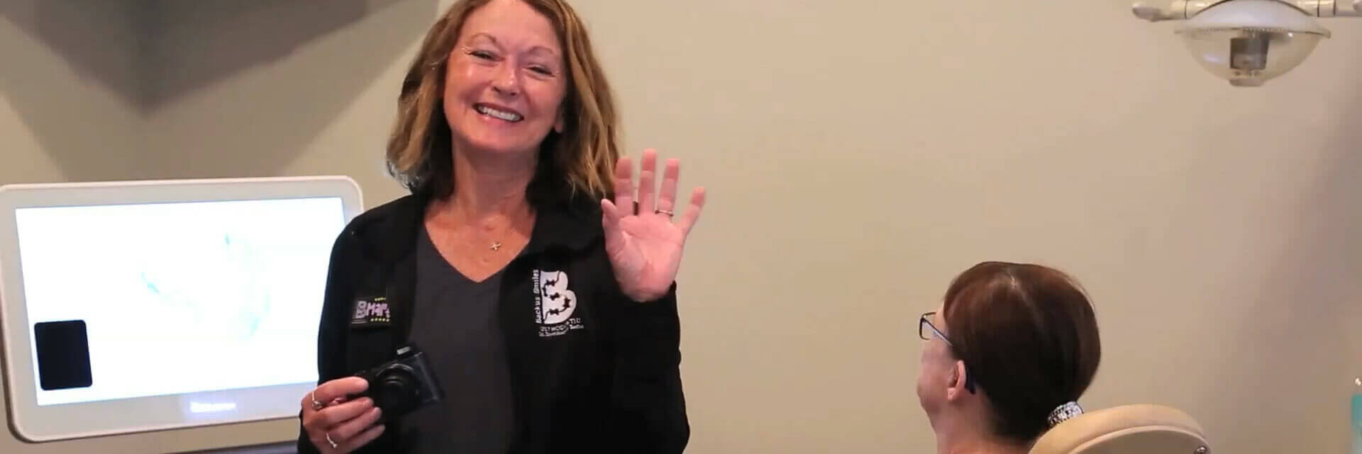 Backus Smiles, Backus Home Slider - Treatment coordinator waving hello